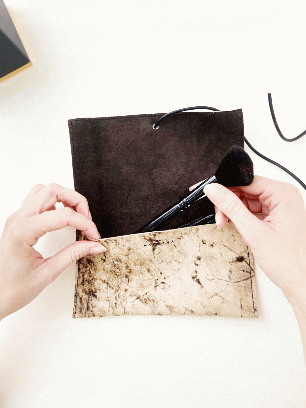 Makeup bag made from real leather and natural rubber. - Image 5