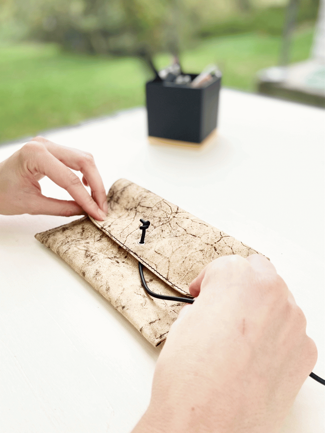 Makeup bag made from real leather and natural rubber.